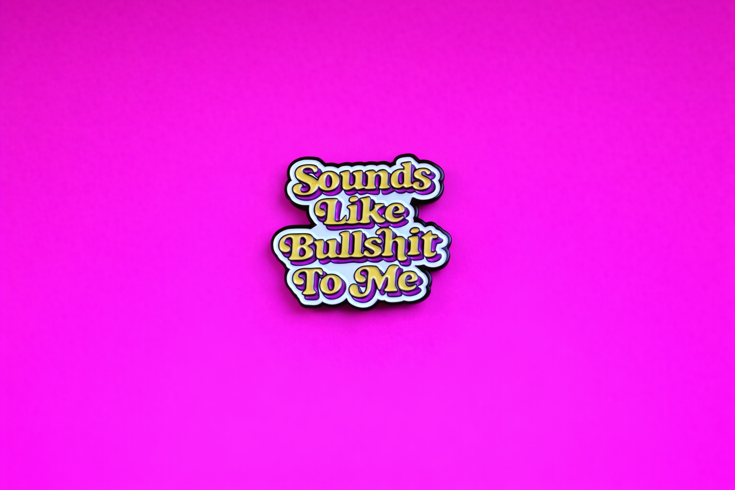 sounds like bullshit sarcastic enamel pin by Petty & Unhinged