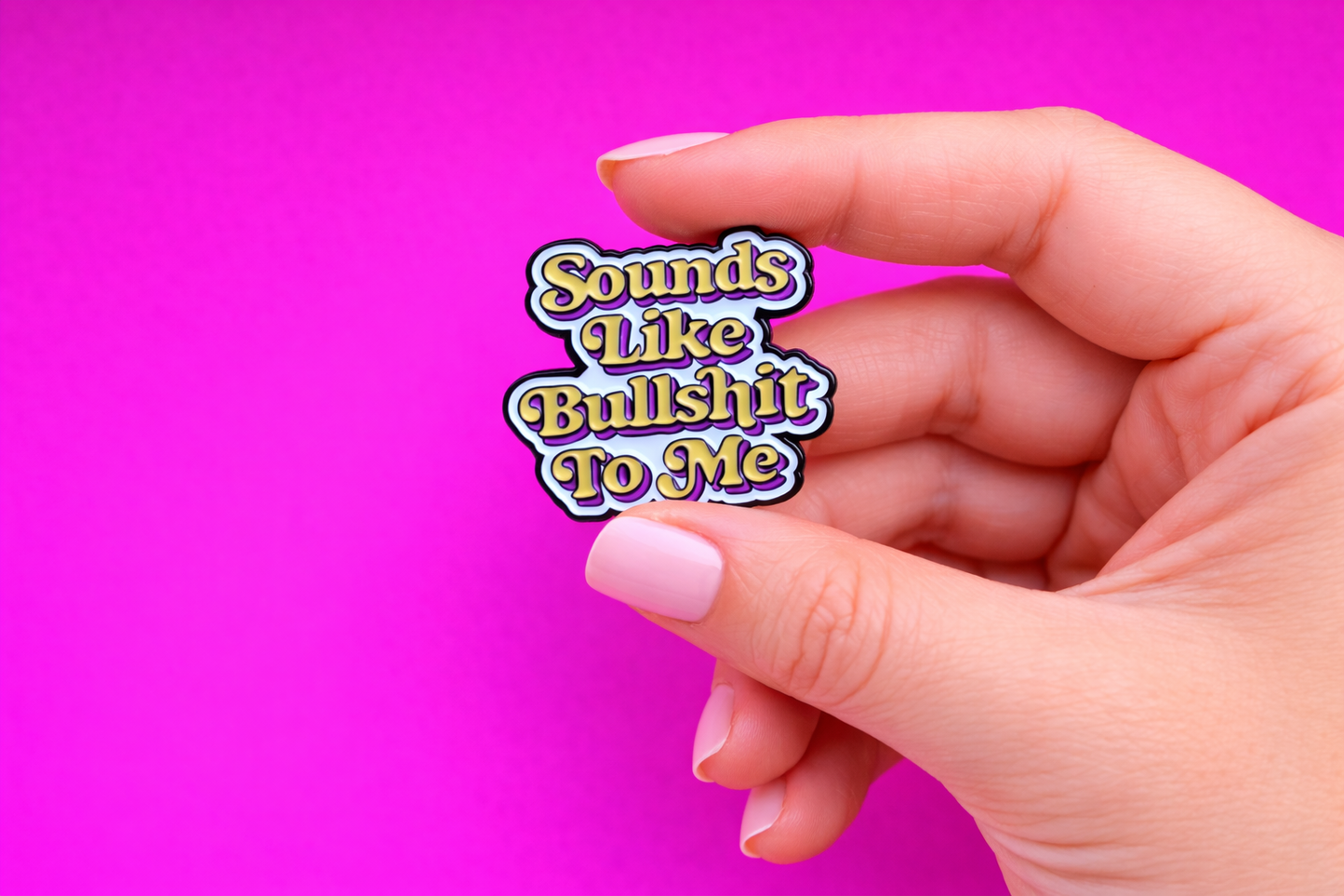 sounds like bullshit sarcastic enamel pin by Petty & Unhinged